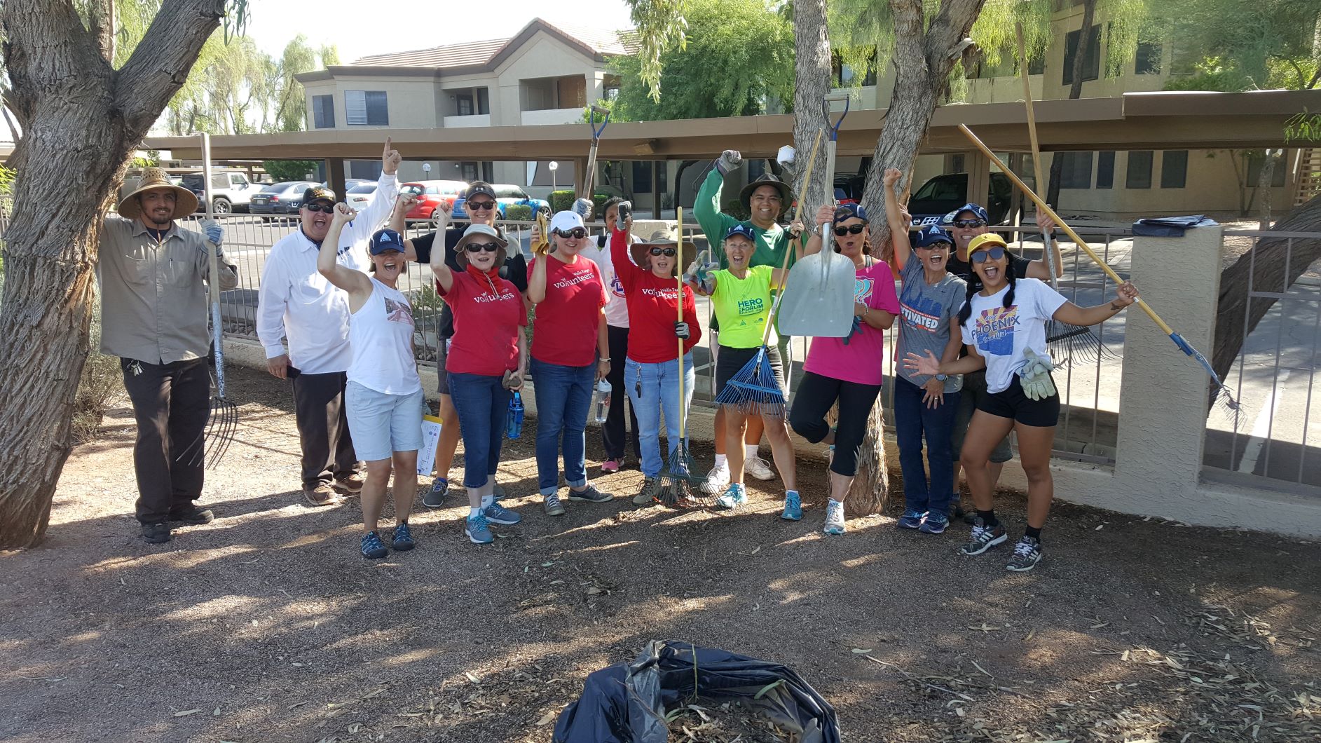 photo of HERO members and staff volunteering in a community garden