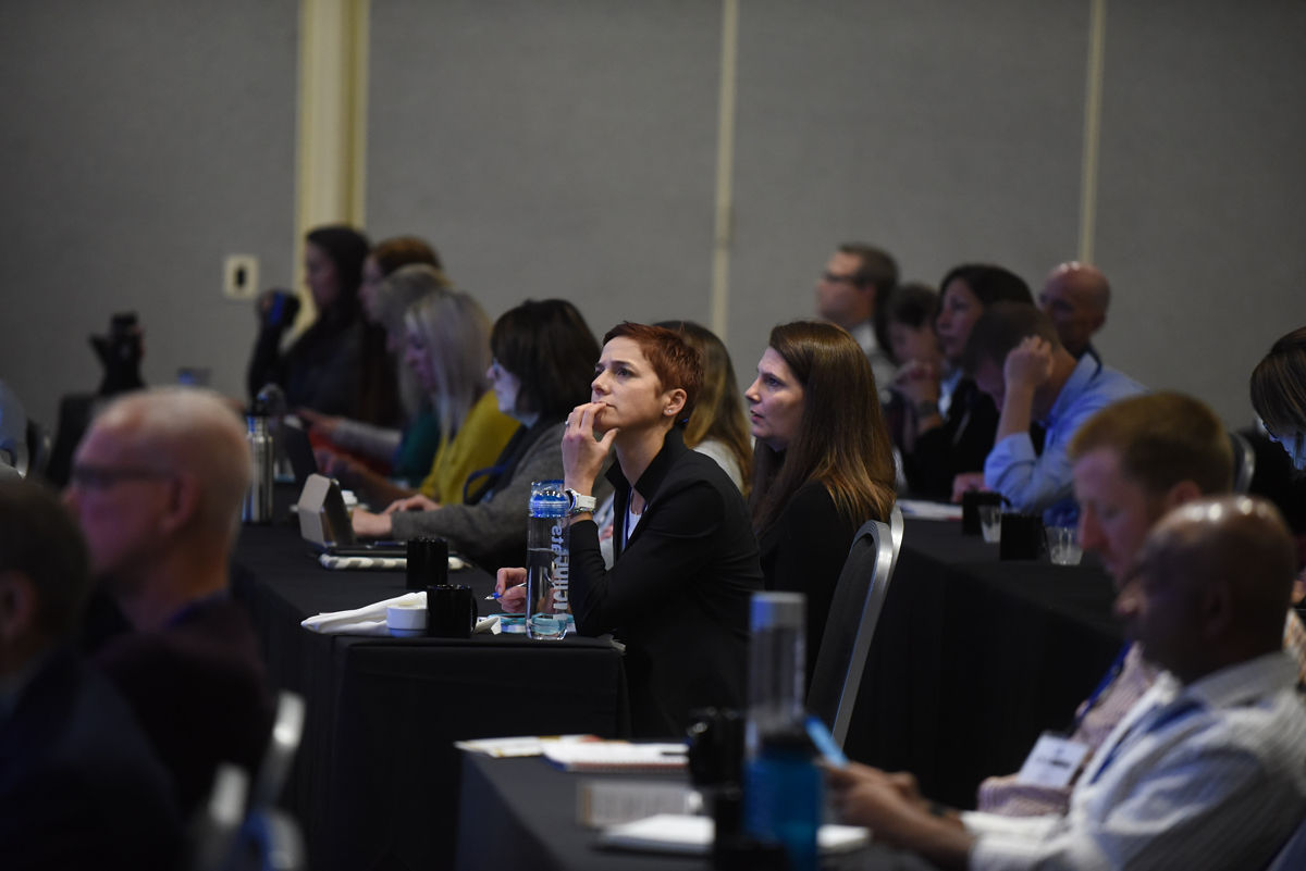 people at HERO Forum conference listening intently